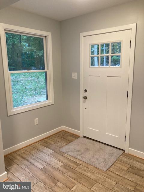 Brand New Foyer Entrance with New Tile Floor