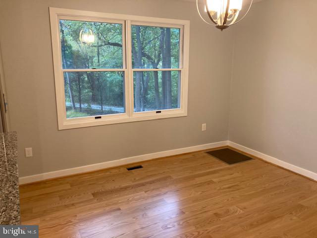 1045 Telegraph Road Coatesville, PA 19320 - Photo 10 of 37 Kitchen Eat-In-Area with New Hardwood Floors