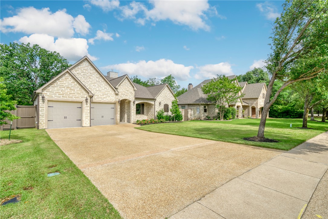 3317 Legacy Court Bryan, TX 77802 - Photo 28 of 28 a front view of house with yard and green space
