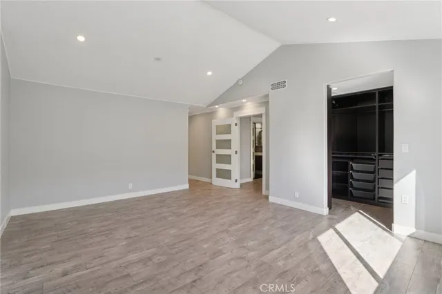 a bathroom with a sink a toilet a mirror and vanity