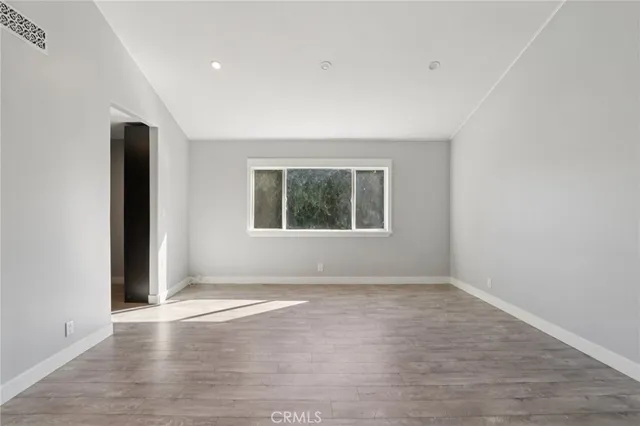 a bathroom with a bathtub a sink and a mirror