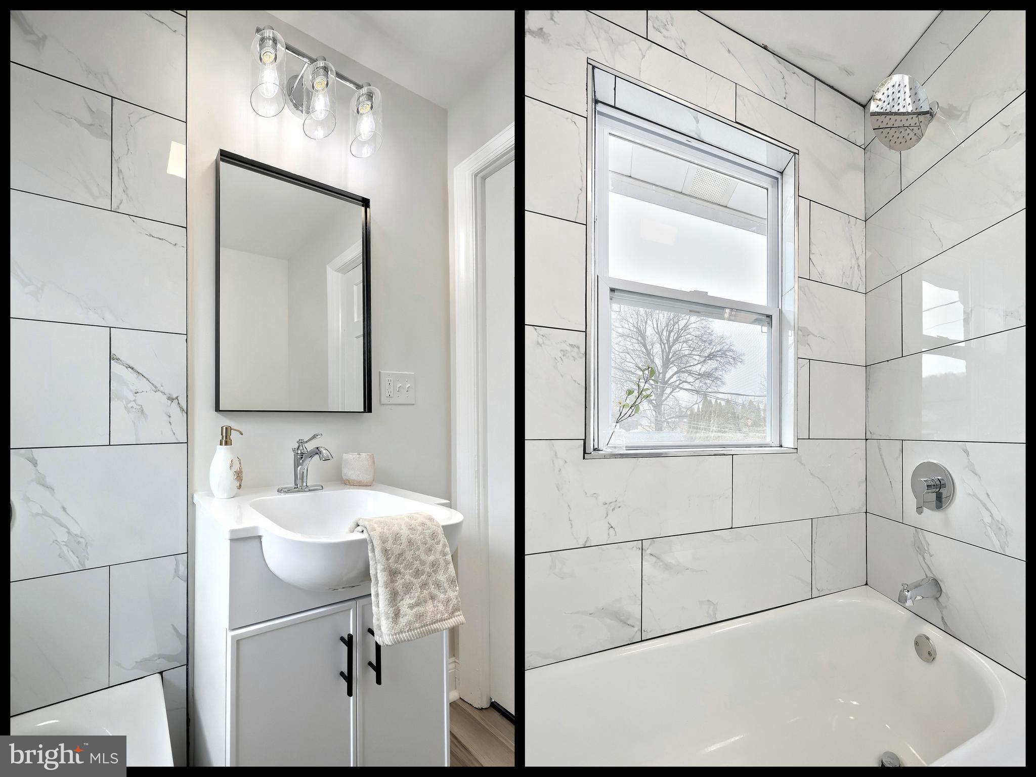1611 Meade Street Reading, PA 19607 - Photo 28 of 59 a bathroom with a sink and mirror with bathtub