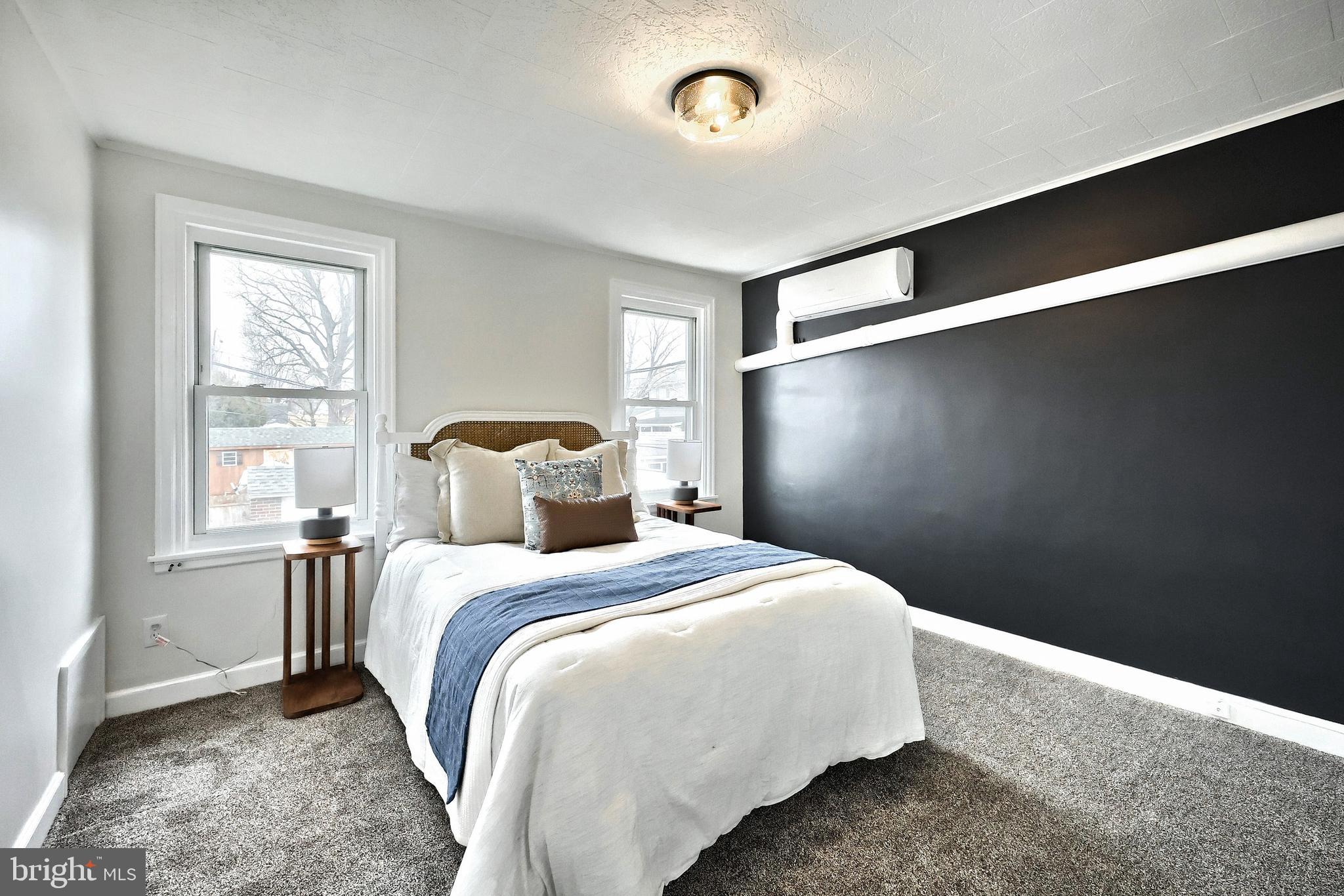 1611 Meade Street Reading, PA 19607 - Photo 29 of 59 a bedroom with a bed and a window