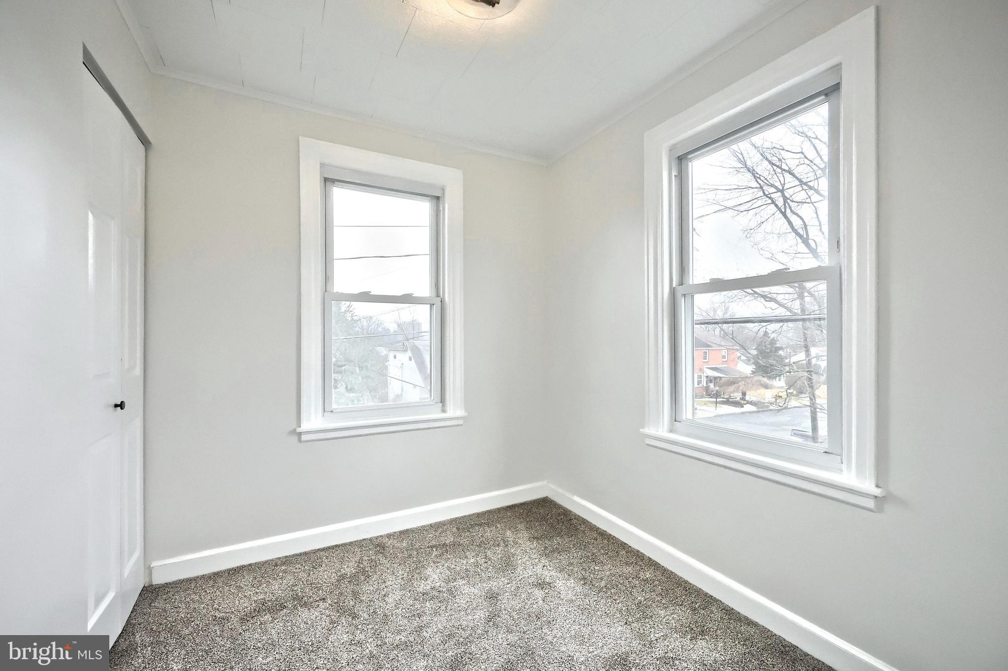 1611 Meade Street Reading, PA 19607 - Photo 34 of 59 a view of an empty room with a window