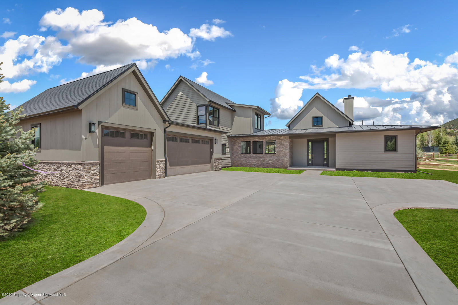347 Equestrian Way Carbondale, CO 81623 - Photo 1 of 31 a front view of a house with a garden and yard