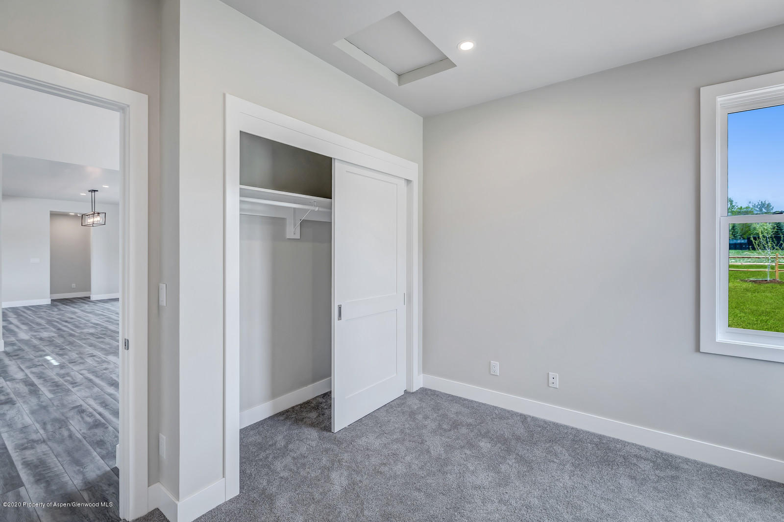 347 Equestrian Way Carbondale, CO 81623 - Photo 13 of 31 an empty room with windows and closet