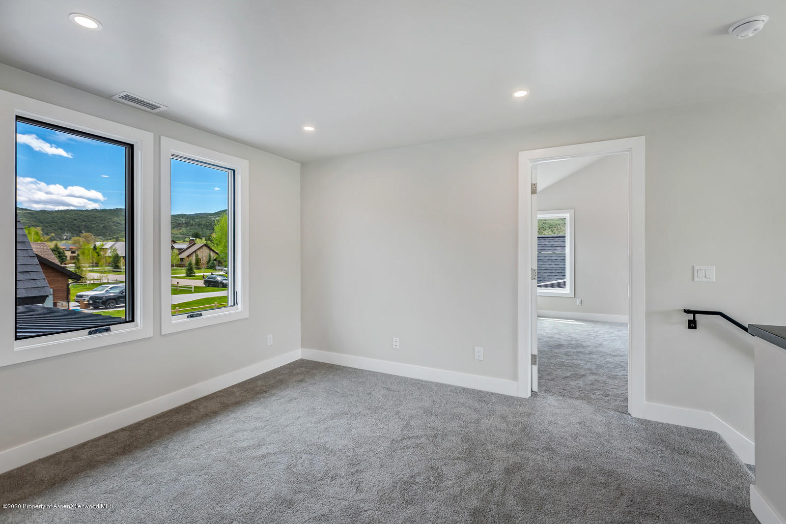 347 Equestrian Way Carbondale, CO 81623 - Photo 20 of 31 a view of an empty room with a window