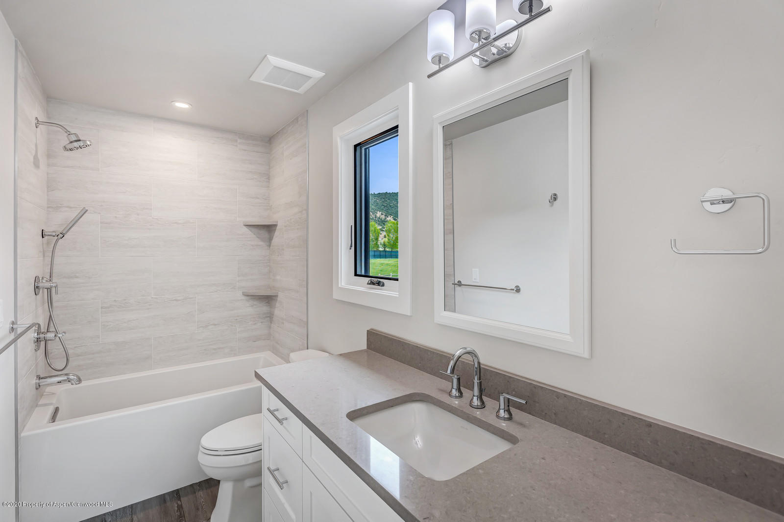 347 Equestrian Way Carbondale, CO 81623 - Photo 26 of 31 a bathroom with a granite countertop bathtub shower sink vanity mirror and toilet