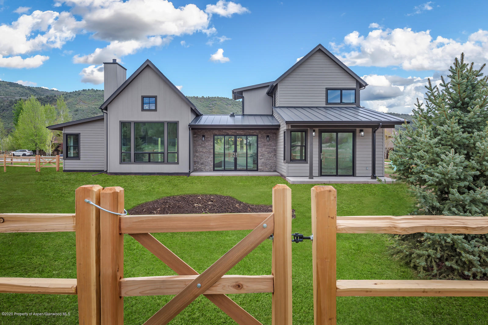 347 Equestrian Way Carbondale, CO 81623 - Photo 30 of 31 a front view of a house with garden