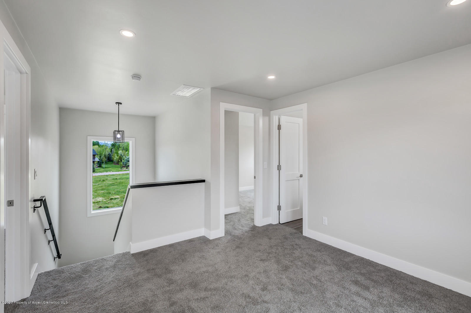 347 Equestrian Way Carbondale, CO 81623 - Photo 8 of 31 a view of an empty room with a window