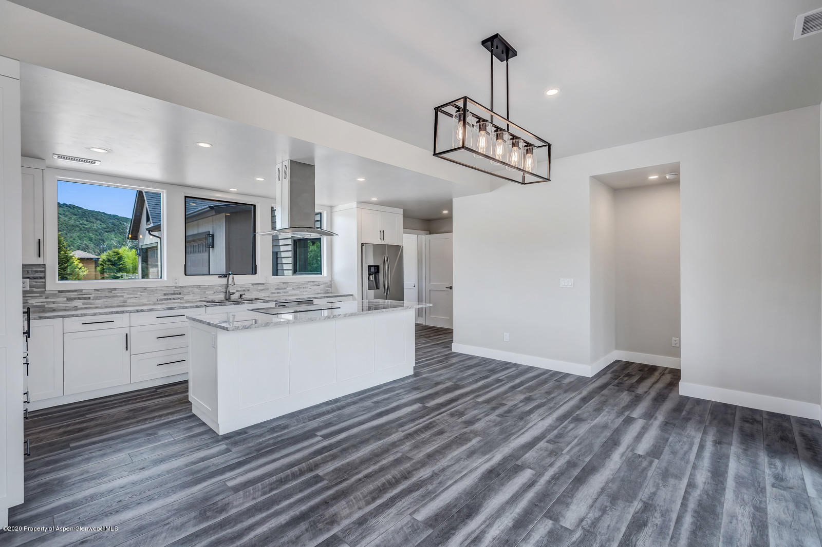 347 Equestrian Way Carbondale, CO 81623 - Photo 10 of 31 a view of living room kitchen and entryway