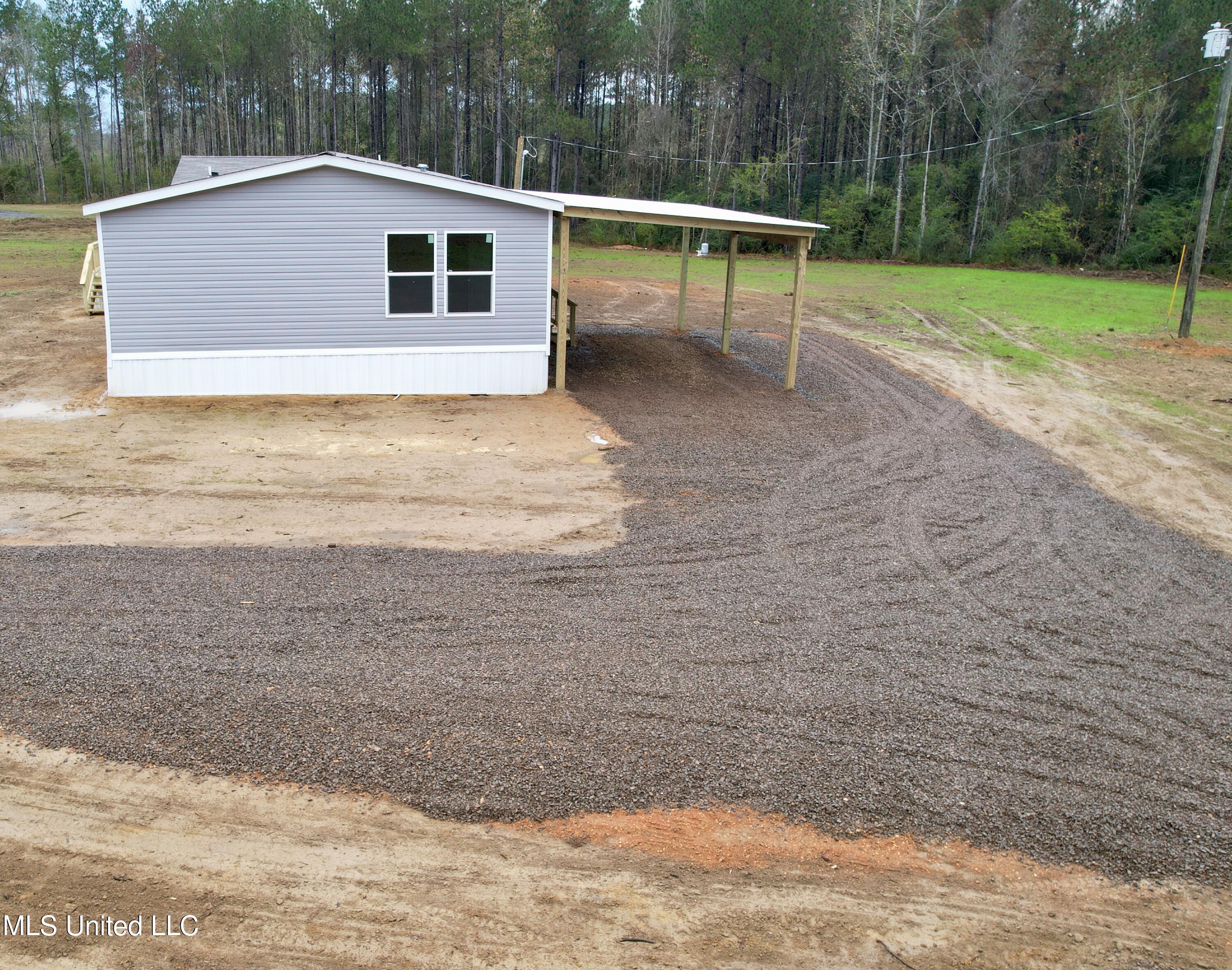 2033 Ceasar Trail Summit, MS 39666 - Photo 21 of 31 dji_fly_20251125_090524_1_1764083330605_