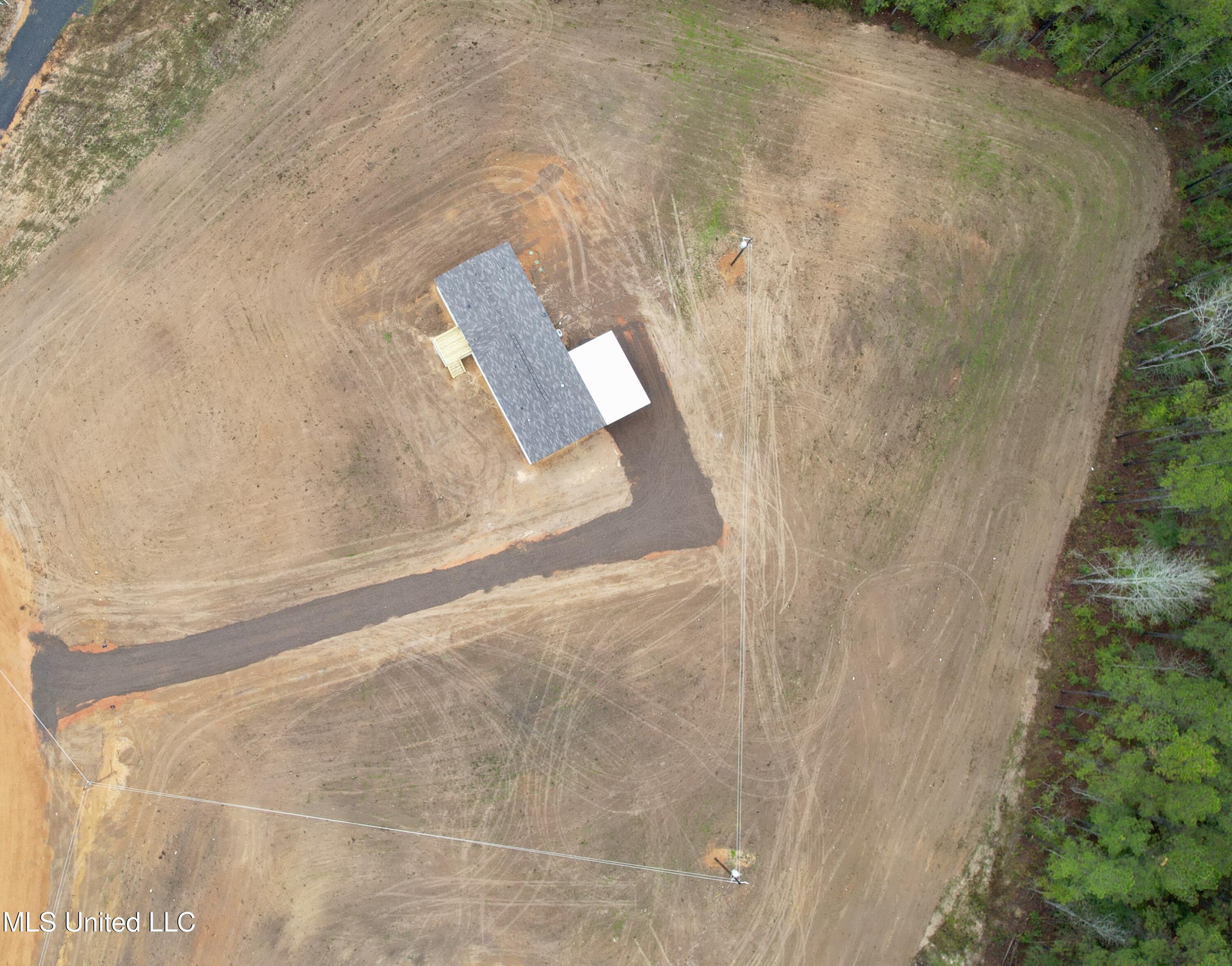 2033 Ceasar Trail Summit, MS 39666 - Photo 24 of 31 dji_fly_20251125_090212_996_176408333644