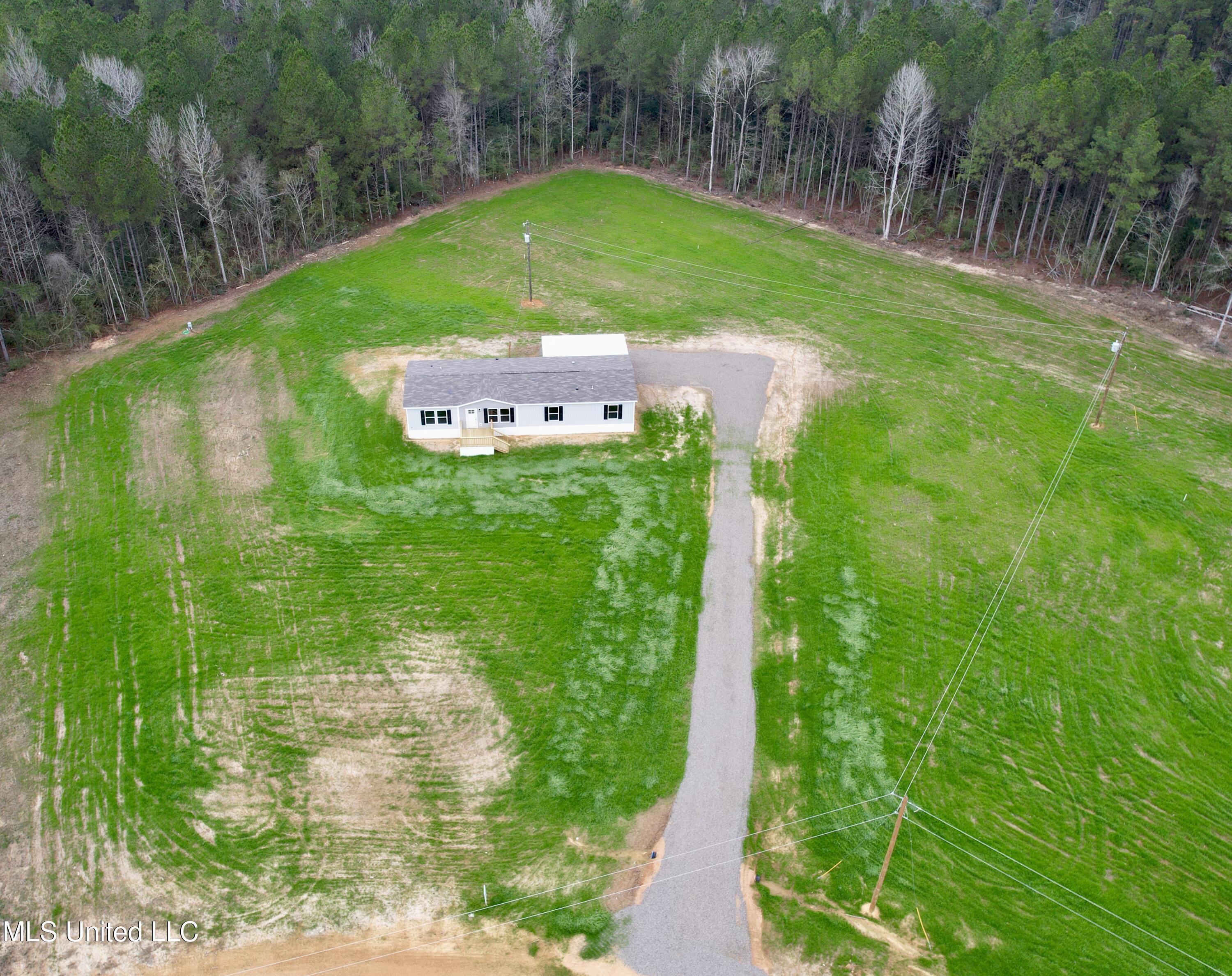 2033 Ceasar Trail Summit, MS 39666 - Photo 30 of 31 dji_fly_20260102_094038_33_1767368959651