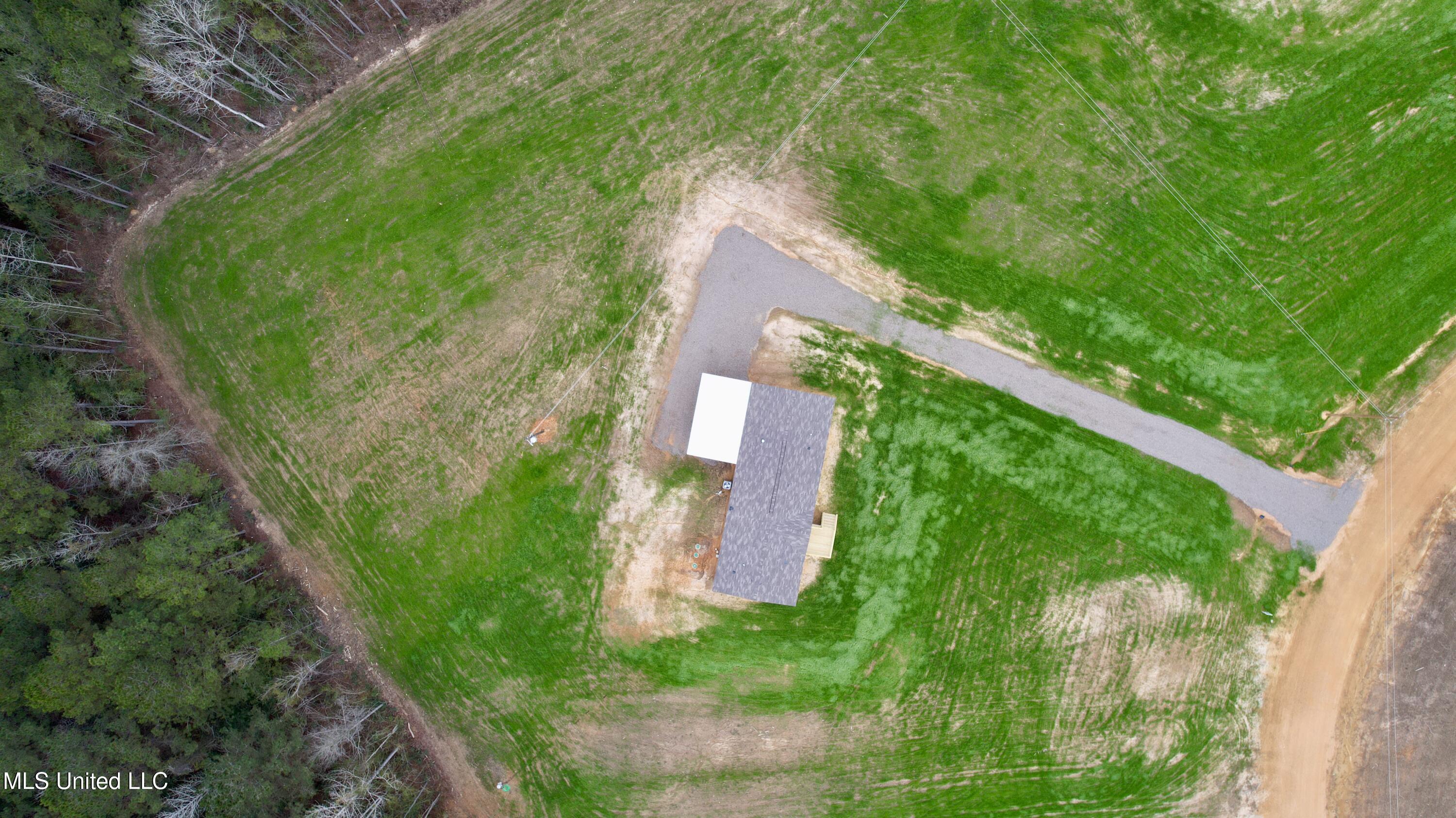 2033 Ceasar Trail Summit, MS 39666 - Photo 31 of 31 dji_fly_20260102_094124_35_1767368956632