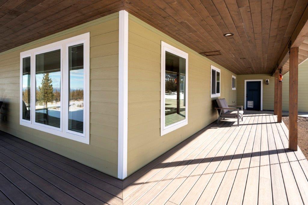 8962 Southwest Copley Road Powell Butte, OR 97753 - Photo 39 of 46 Good covered transition from the deck to the garage with access through the man door