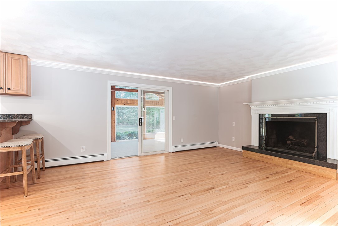 680 Fletcher Road North Kingstown, RI 02852 - Photo 11 of 50 Family room opens into kitchen and sunroom
