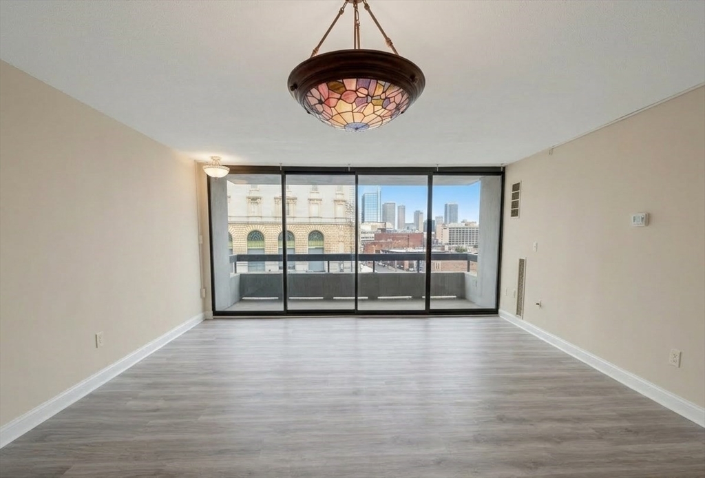 566 Commonwealth Avenue, Unit 308 Boston, MA 02215 - Photo 2 of 14 a view of an empty room with a window