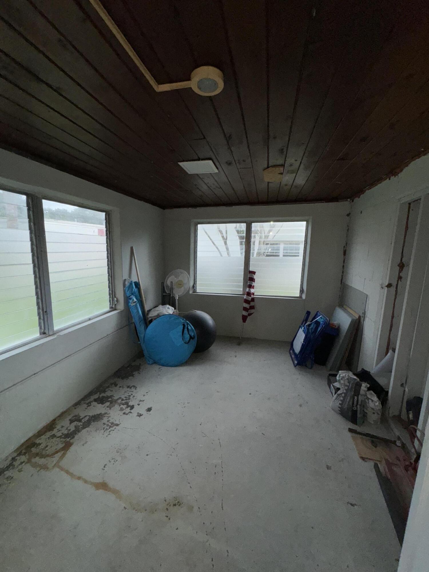 1825 Palm Boulevard Melbourne, FL 32901 - Photo 15 of 25 a view of room with furniture and a window