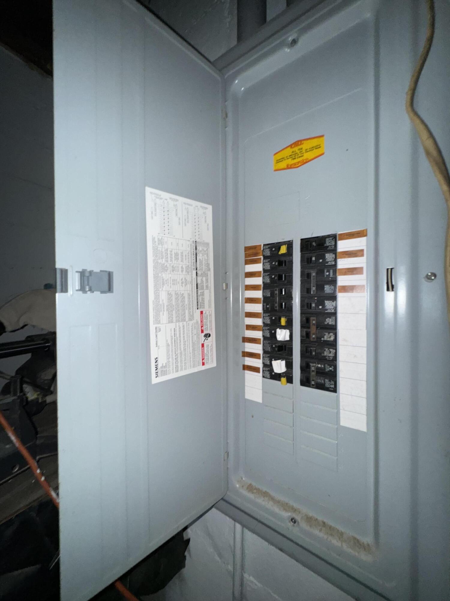 1825 Palm Boulevard Melbourne, FL 32901 - Photo 17 of 25 a view of an entryway with wooden floor and a window