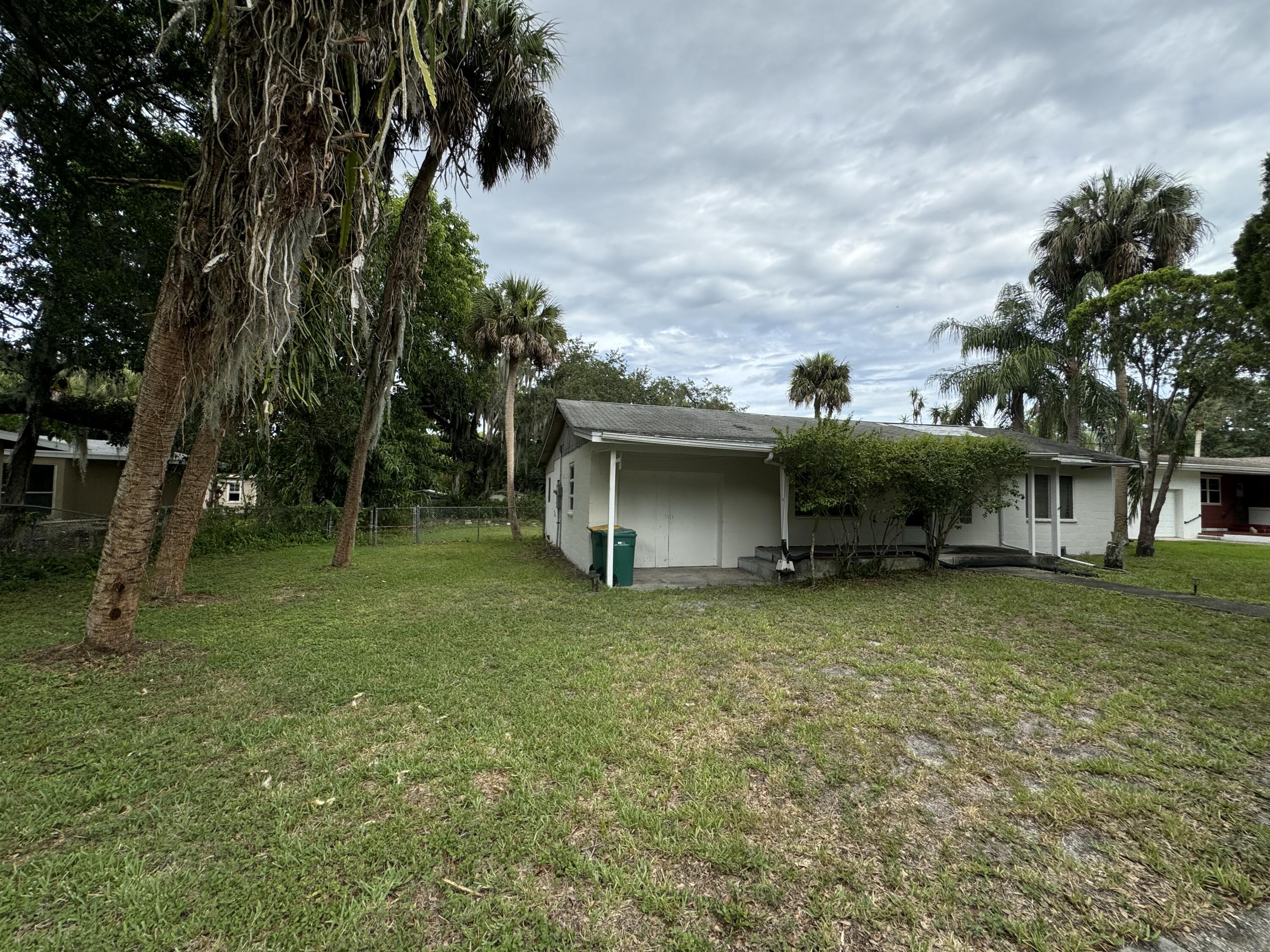 1825 Palm Boulevard Melbourne, FL 32901 - Photo 2 of 25 a view of a house with a backyard