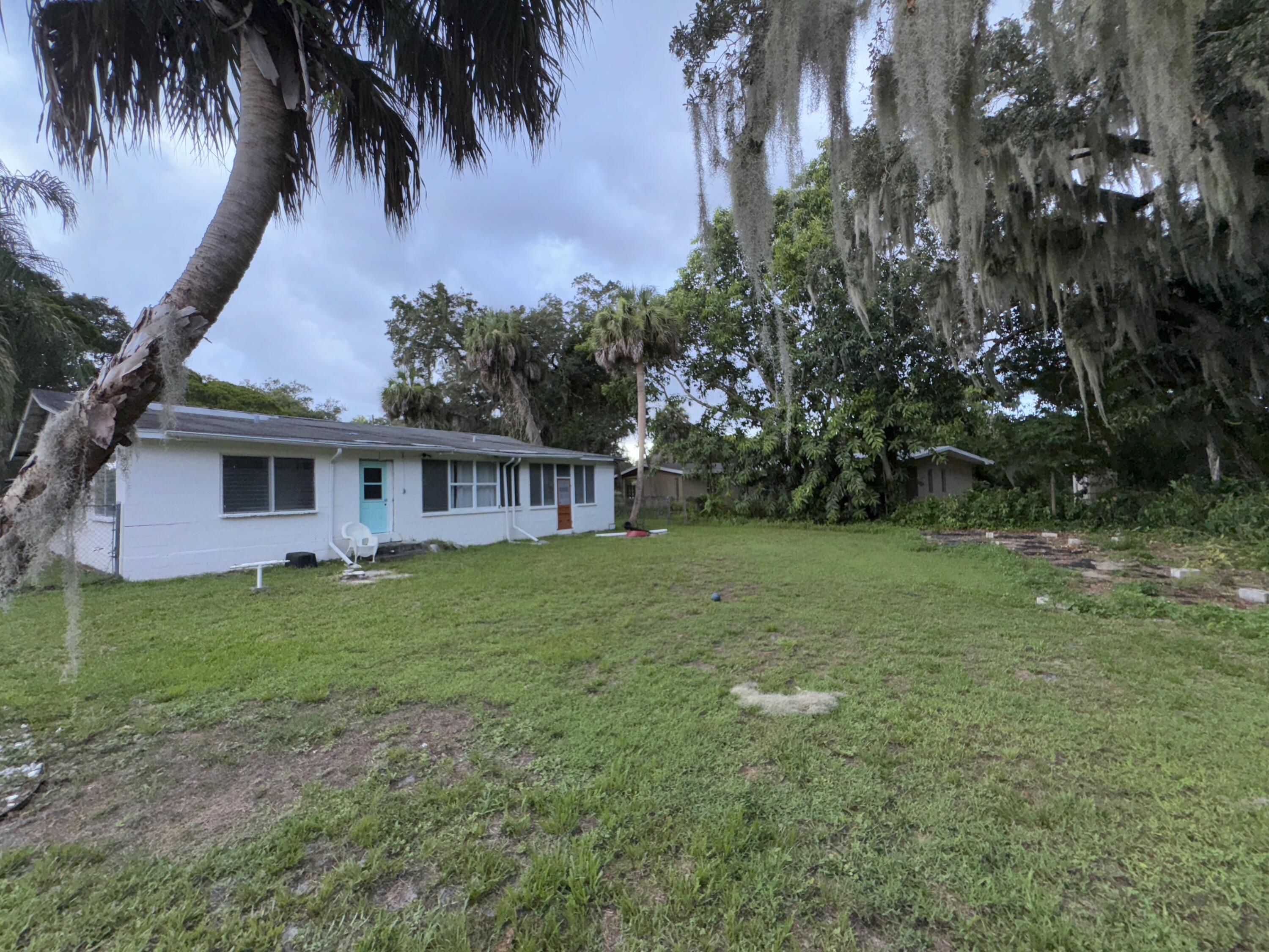 1825 Palm Boulevard Melbourne, FL 32901 - Photo 21 of 25 a view of a house with a backyard