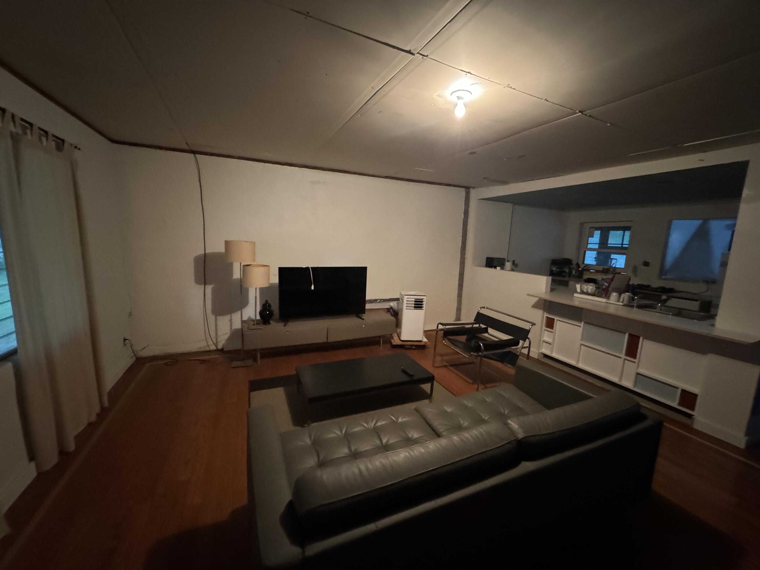 1825 Palm Boulevard Melbourne, FL 32901 - Photo 6 of 25 a kitchen with sink refrigerator and stove top oven