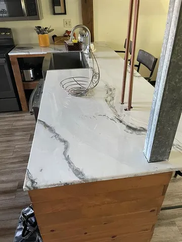 a picture of water heater room with furniture