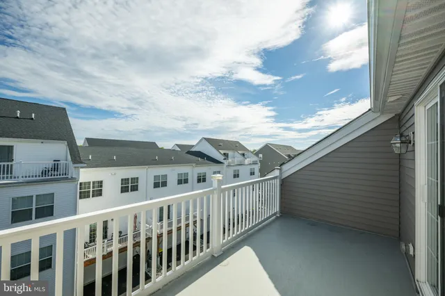a view of a house with roof deck