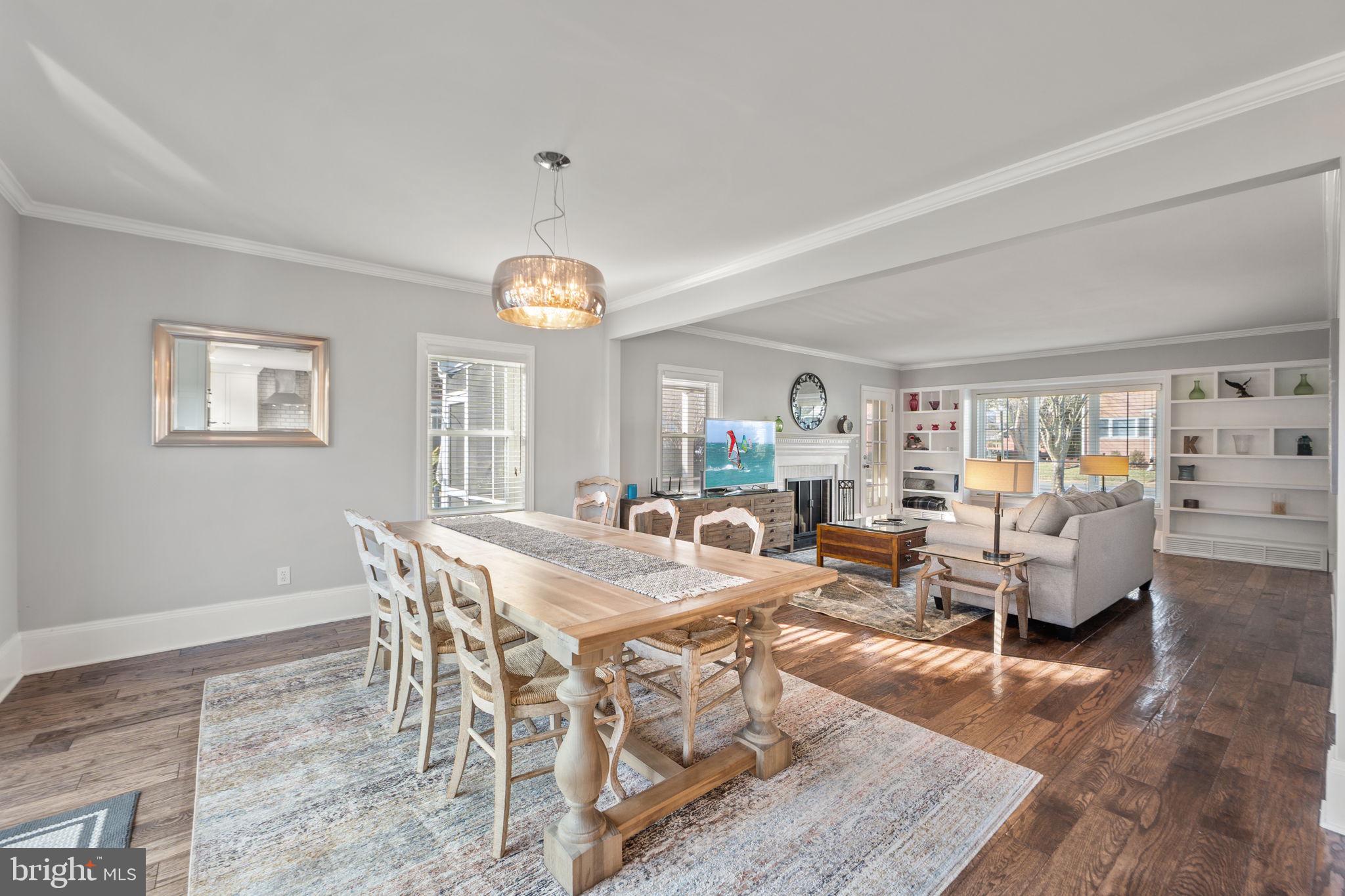 706 Fairview Avenue Frederick, MD 21701 - Photo 12 of 48 a view of a dining room with furniture a rug and wooden floor