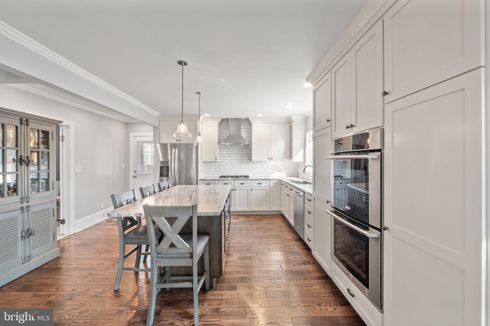 706 Fairview Avenue Frederick, MD 21701 - Photo 13 of 48 a kitchen with cabinets and stainless steel appliances