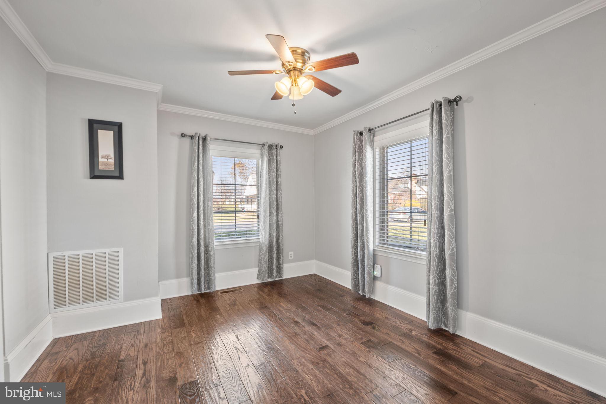 706 Fairview Avenue Frederick, MD 21701 - Photo 20 of 48 wooden floor in an empty room with a window