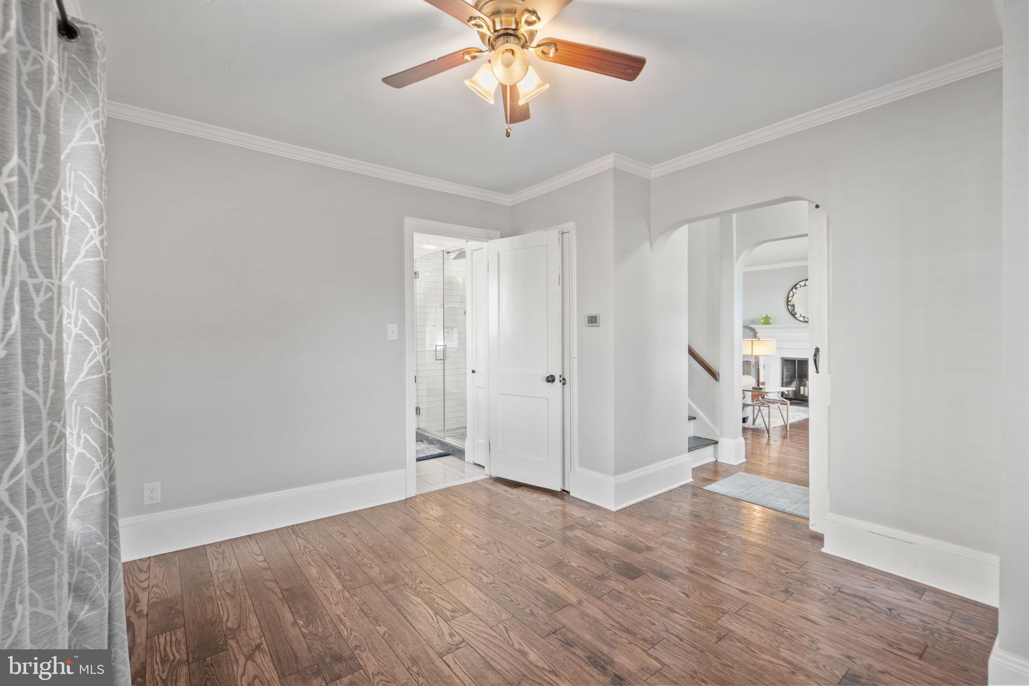 706 Fairview Avenue Frederick, MD 21701 - Photo 22 of 48 wooden floor in an empty room with a window
