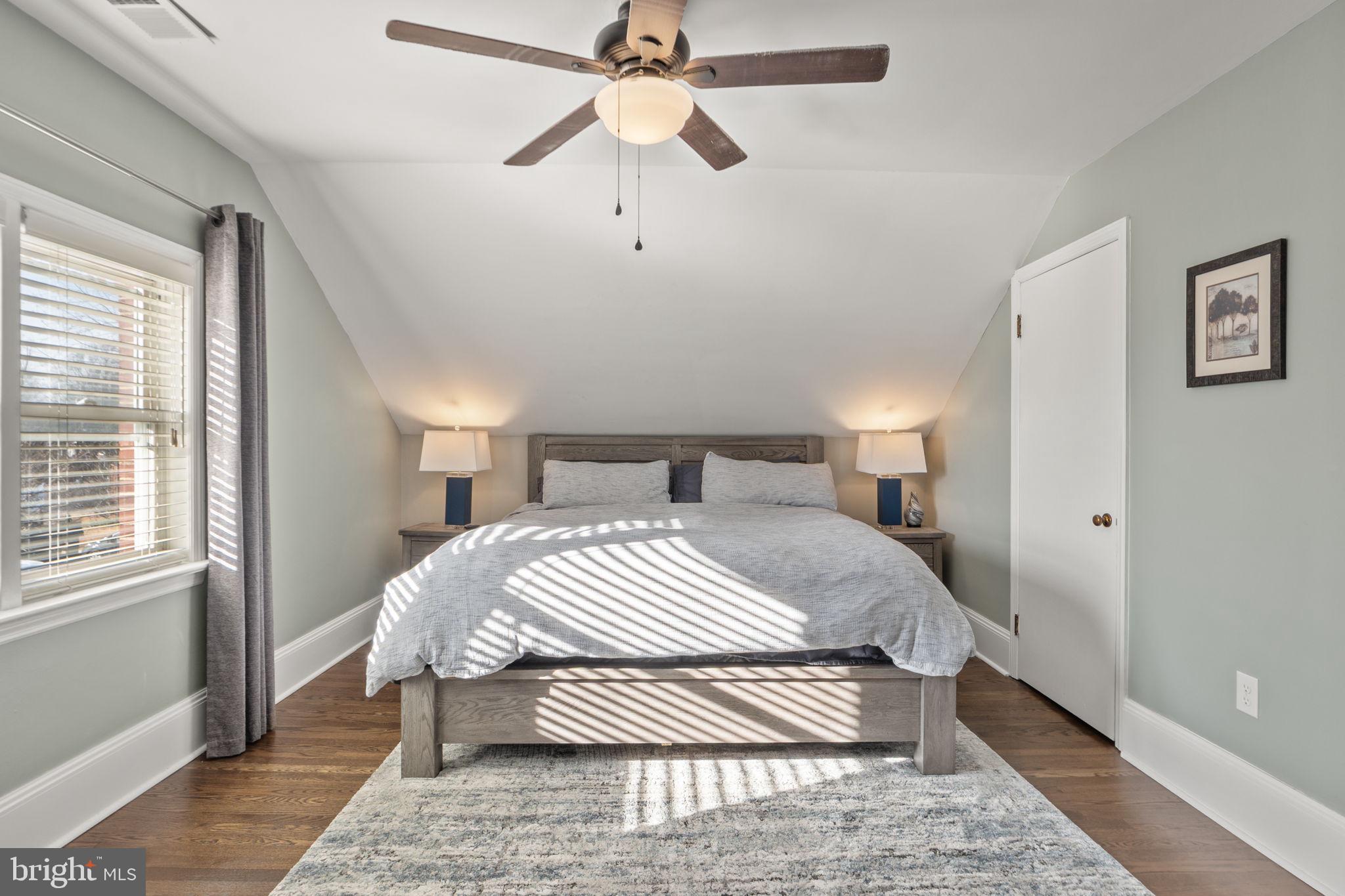 706 Fairview Avenue Frederick, MD 21701 - Photo 24 of 48 a bedroom with a bed and wooden floor