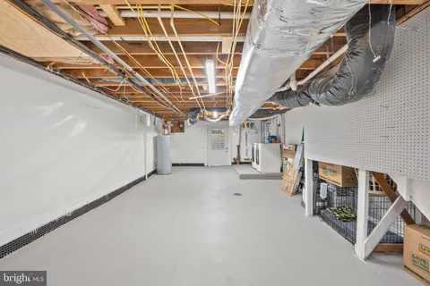 a view of an empty room with stairs