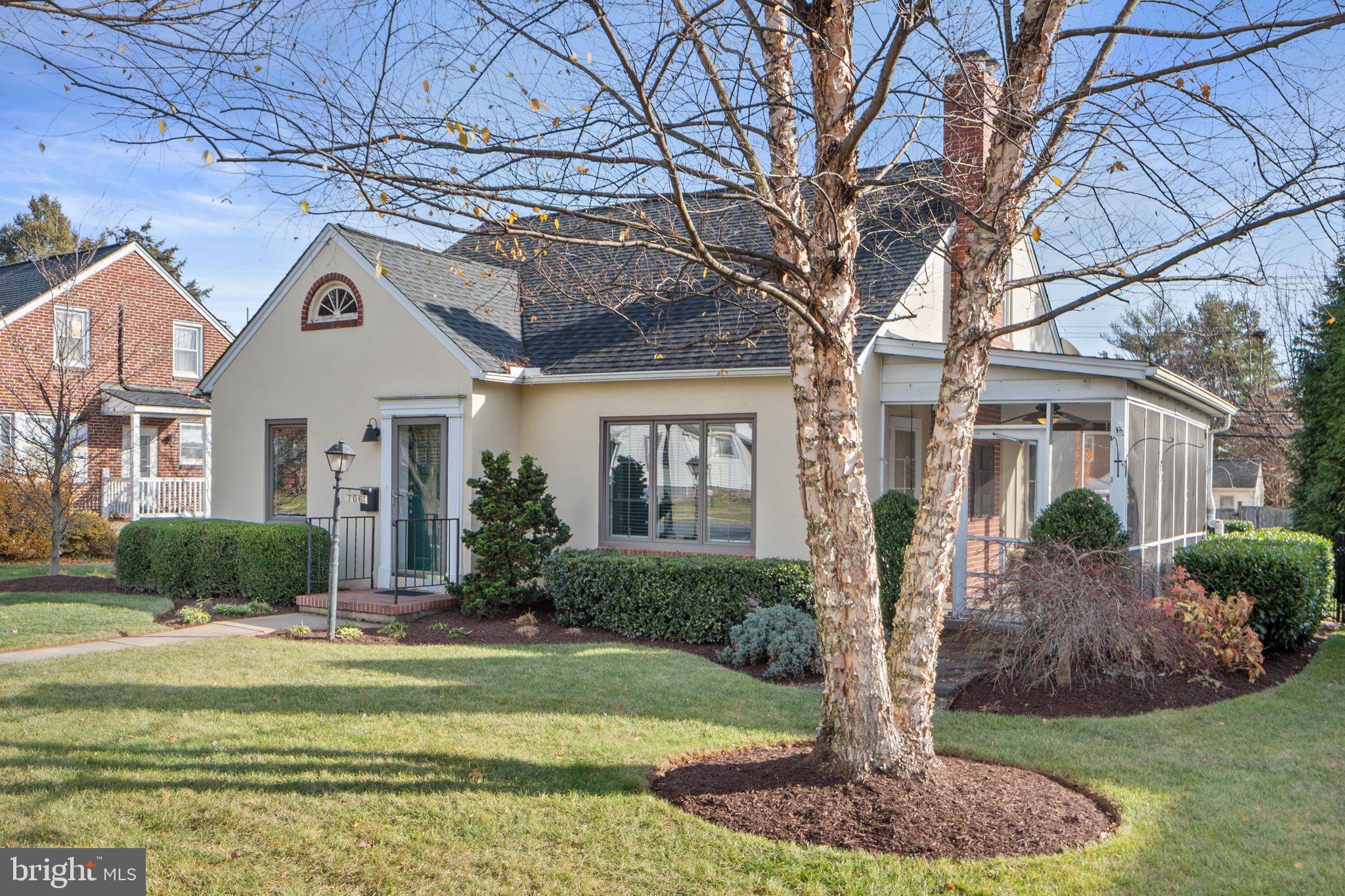 706 Fairview Avenue Frederick, MD 21701 - Photo 4 of 48 a front view of a house with a yard