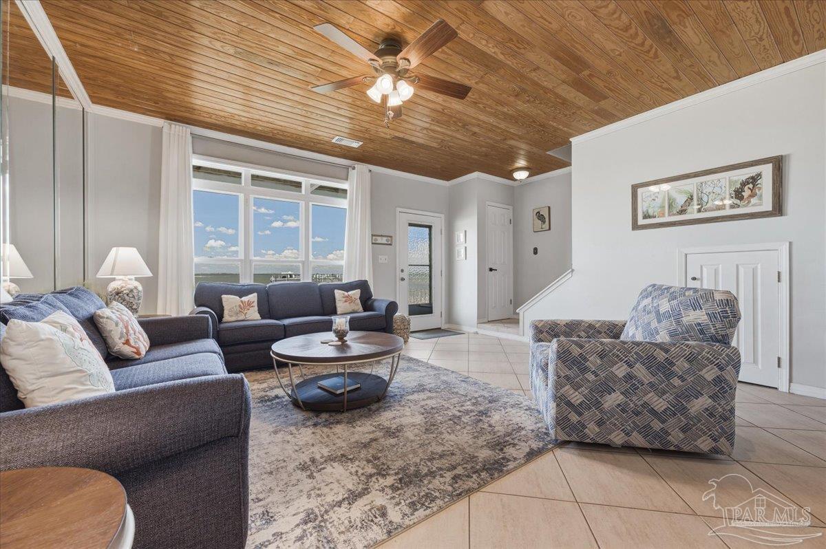 26063 Canal Road, Unit 3F Orange Beach, AL 36561 - Photo 20 of 72 a living room with furniture and a large window