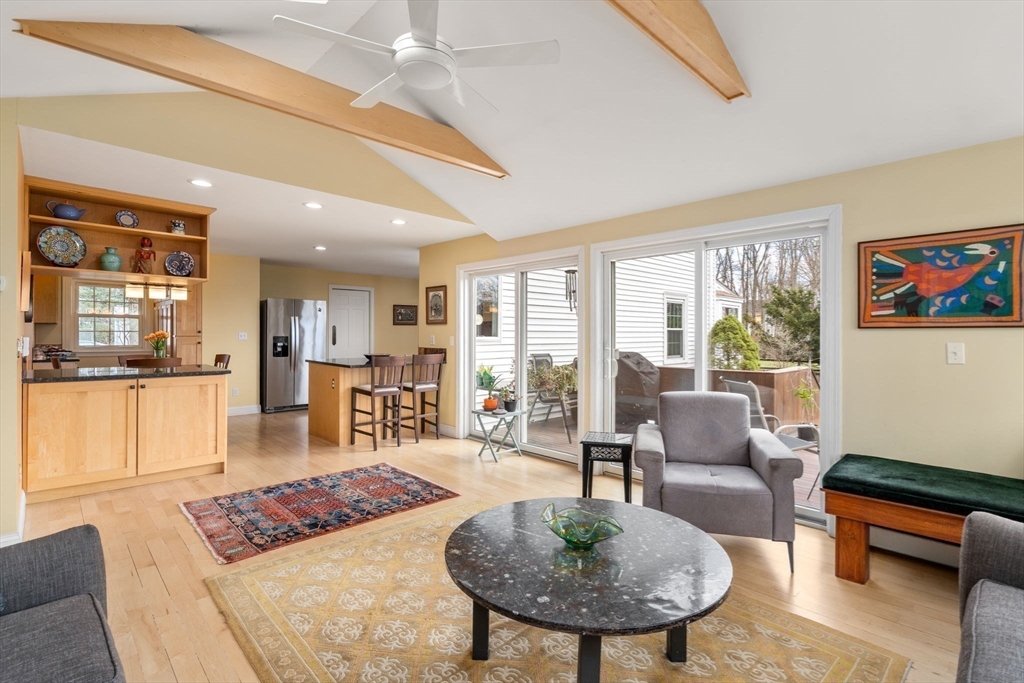 43 Palmer Road Newton, MA 02468 - Photo 27 of 40 a living room with furniture and a table