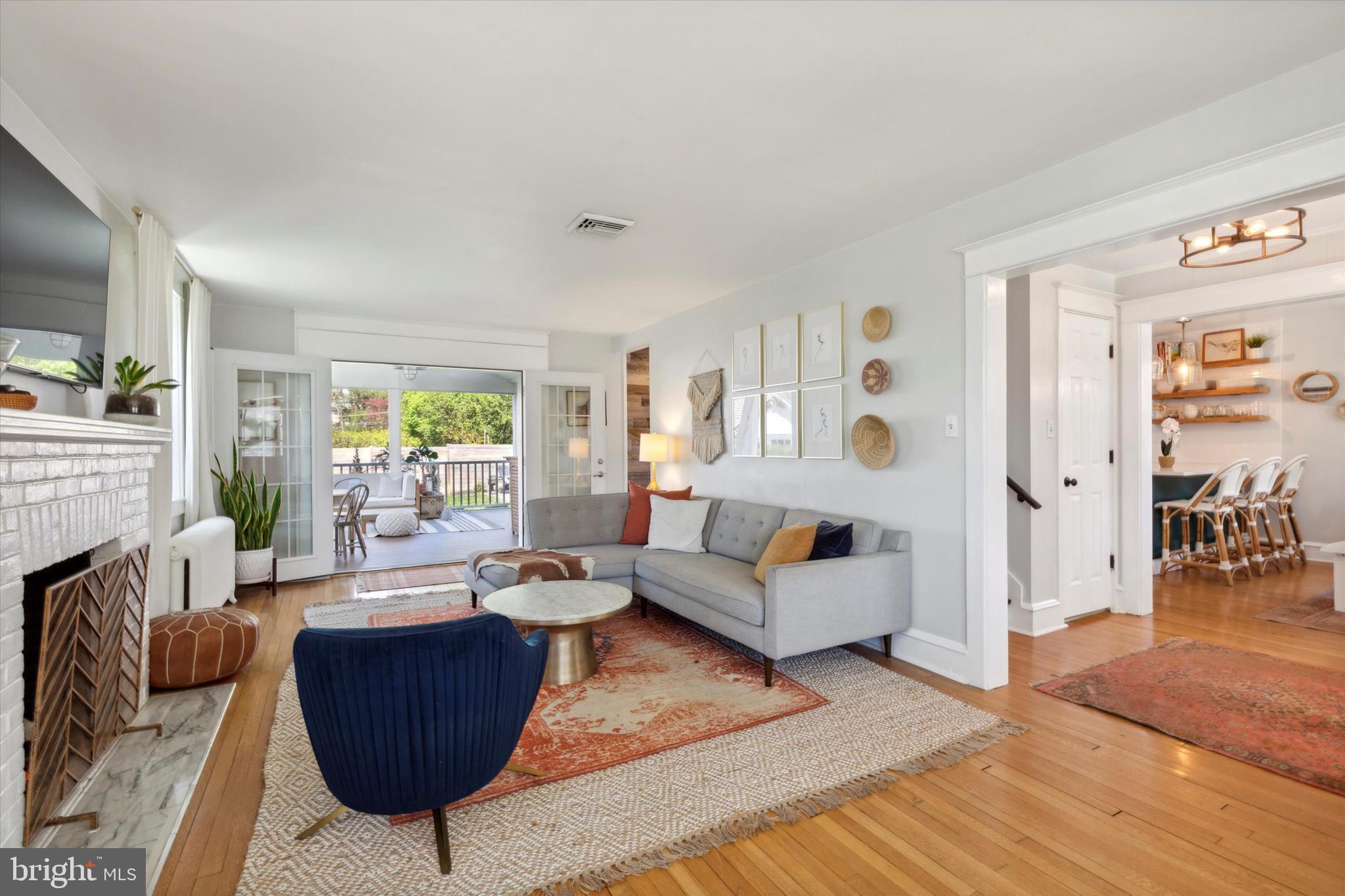 403 Old Lancaster Road Berwyn, PA 19312 - Photo 11 of 41 a living room with furniture or couch and a wooden floor