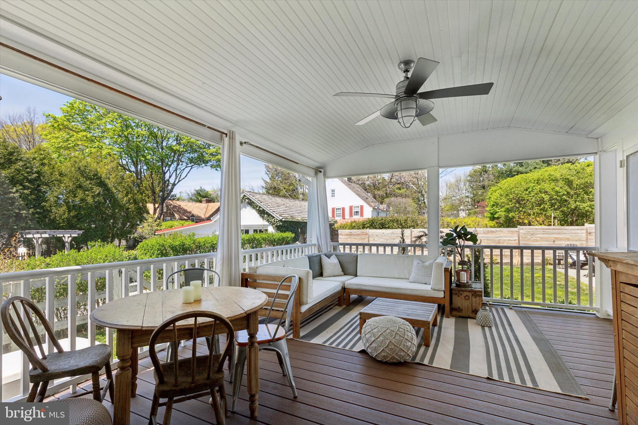 403 Old Lancaster Road Berwyn, PA 19312 - Photo 13 of 41 a view of a chairs and table on the deck