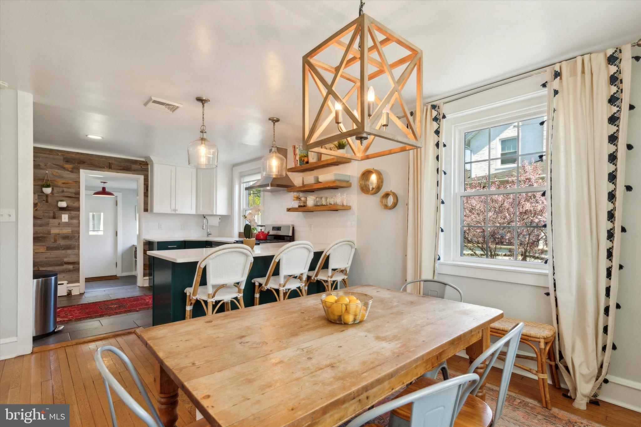 403 Old Lancaster Road Berwyn, PA 19312 - Photo 14 of 41 a view of a dining room and livingroom