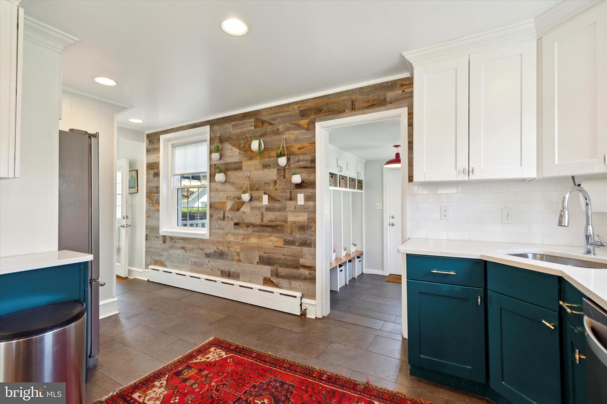 403 Old Lancaster Road Berwyn, PA 19312 - Photo 17 of 41 a hallway with a view of living room
