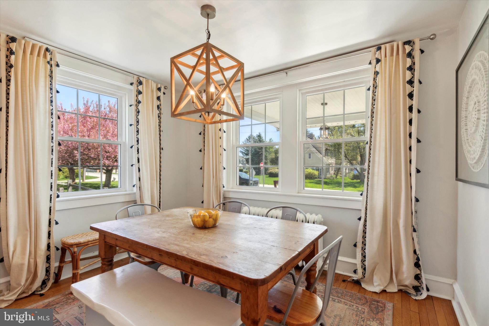 403 Old Lancaster Road Berwyn, PA 19312 - Photo 19 of 41 a view of a dining room with furniture window and wooden floor