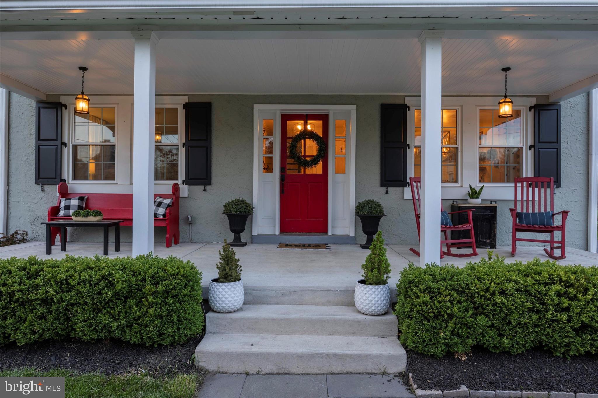 403 Old Lancaster Road Berwyn, PA 19312 - Photo 2 of 41 a front view of a building with potted plants