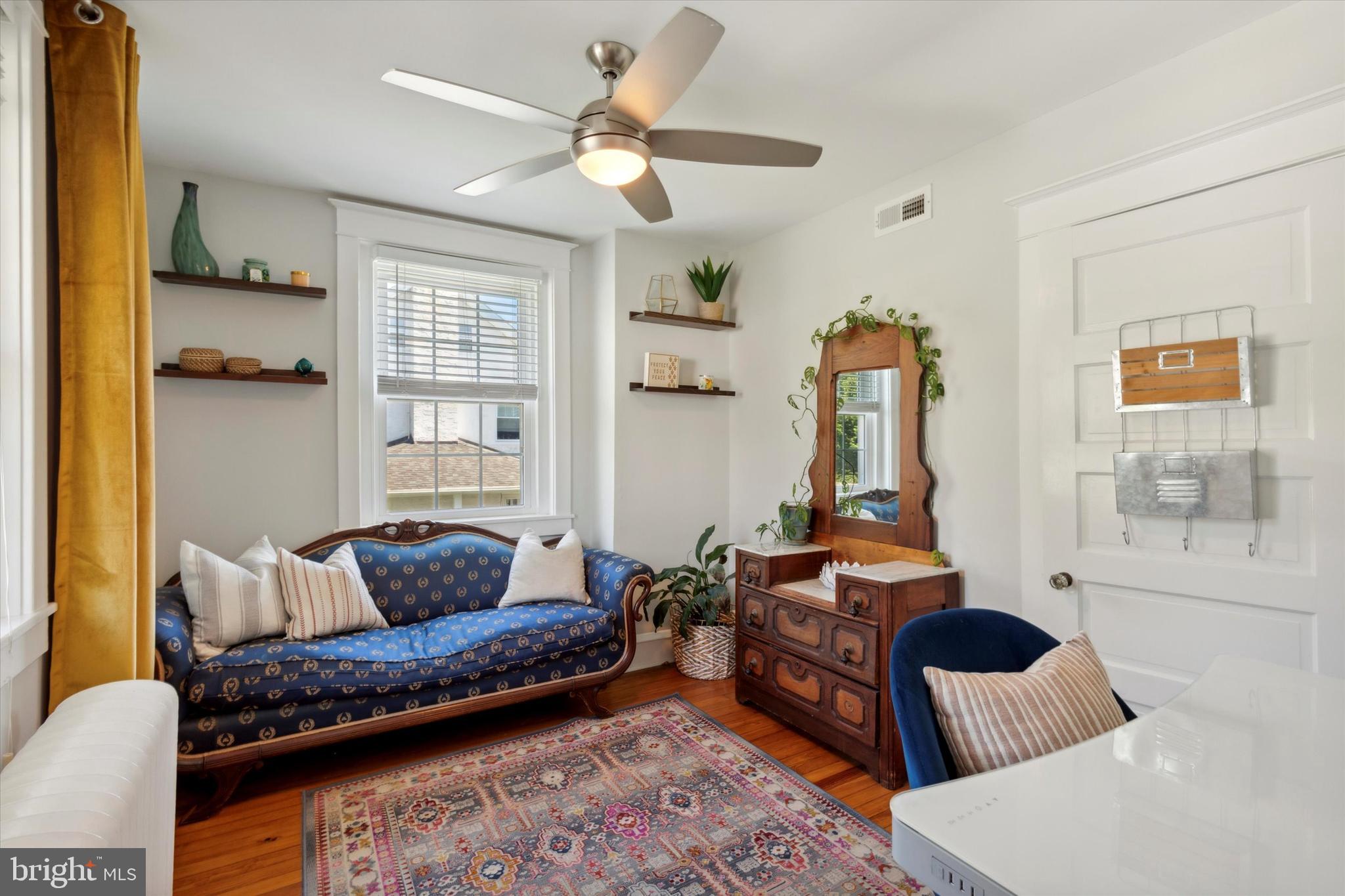 403 Old Lancaster Road Berwyn, PA 19312 - Photo 23 of 41 a living room with furniture rug and window