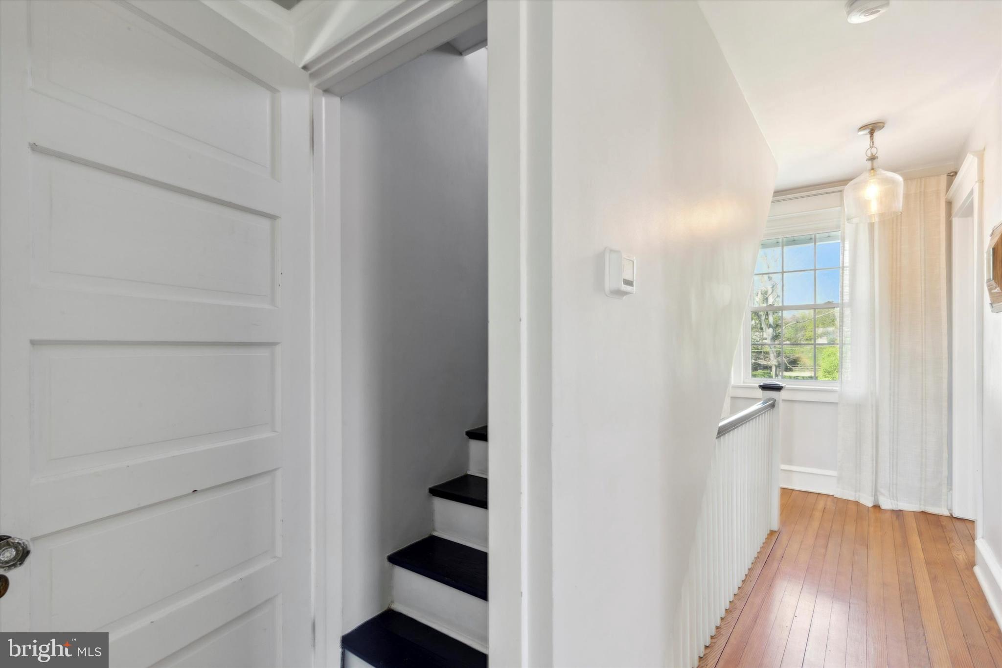 403 Old Lancaster Road Berwyn, PA 19312 - Photo 27 of 41 a view of a hallway with wooden floor and closet