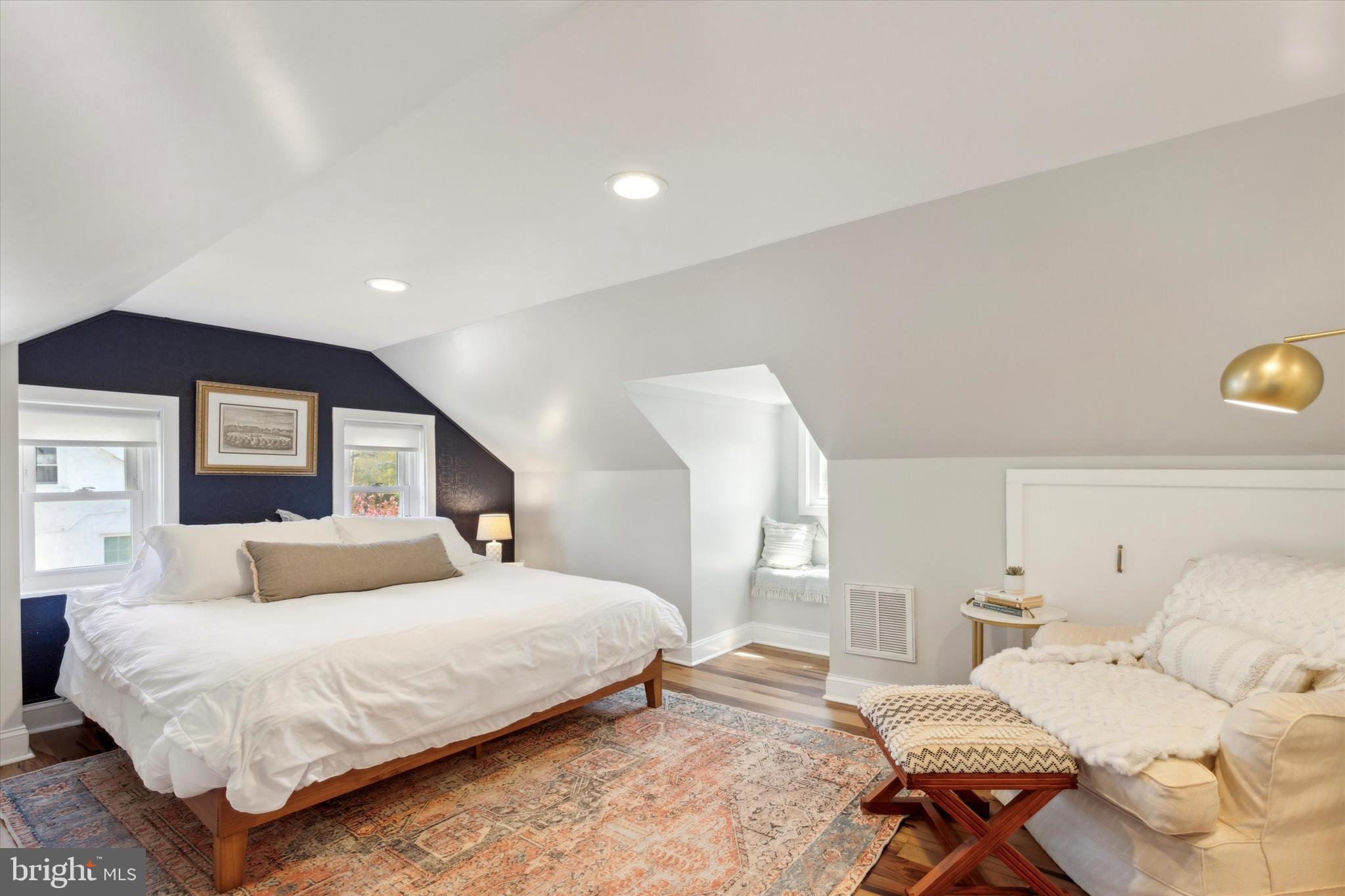 403 Old Lancaster Road Berwyn, PA 19312 - Photo 28 of 41 a bedroom with a bed and a lamp