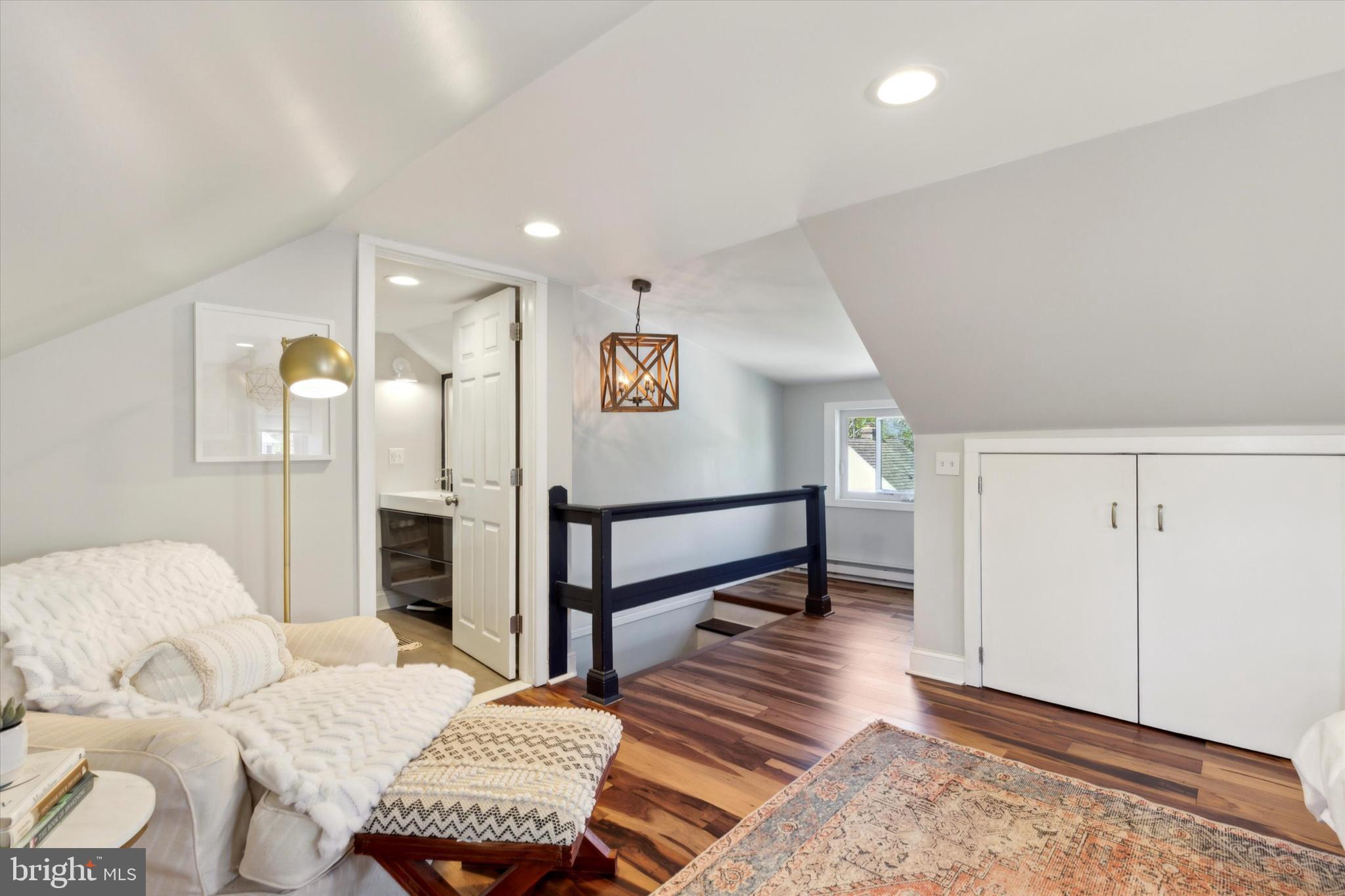 403 Old Lancaster Road Berwyn, PA 19312 - Photo 29 of 41 a bedroom with furniture and a wooden floor