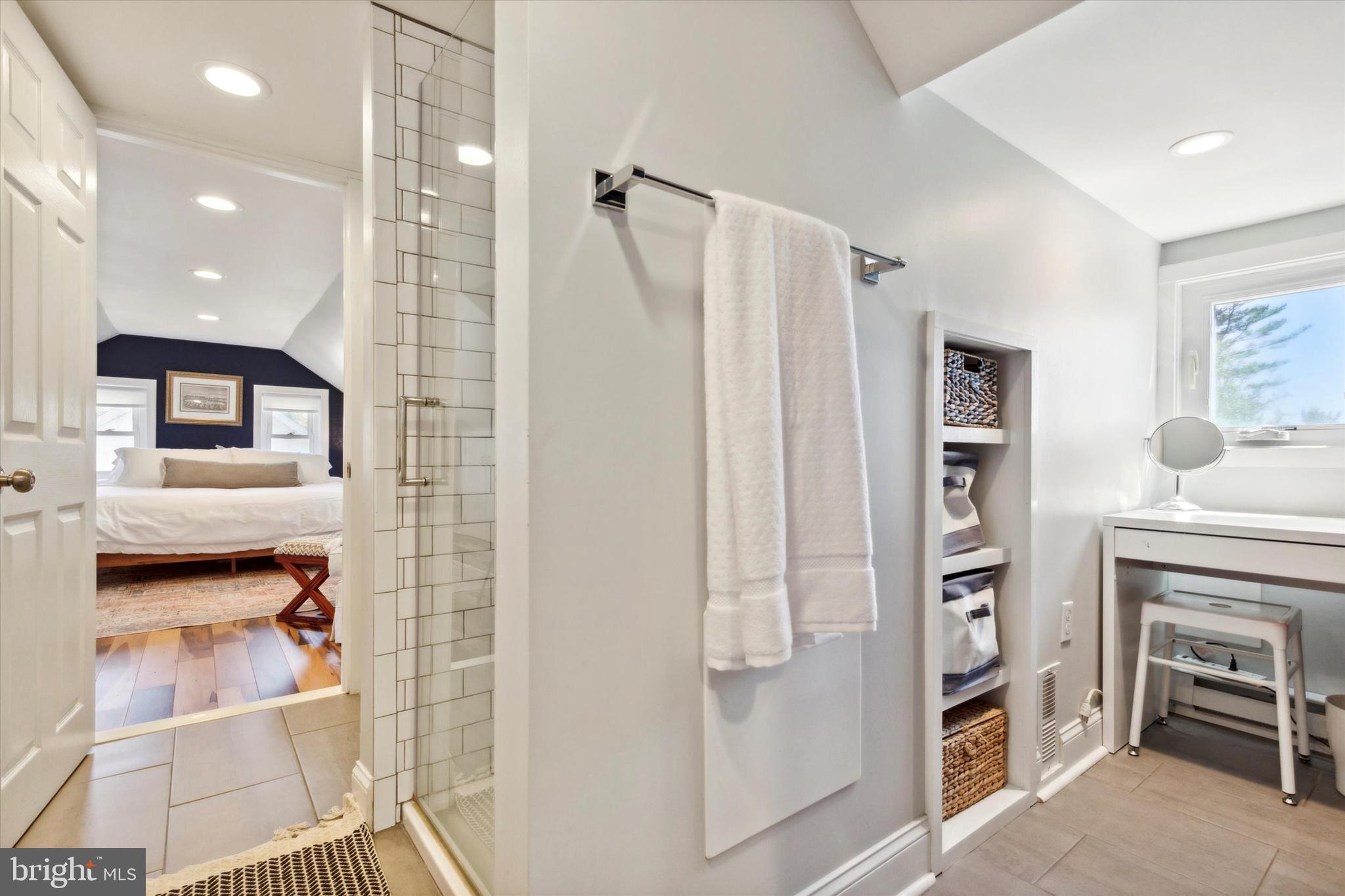 403 Old Lancaster Road Berwyn, PA 19312 - Photo 31 of 41 a living room with furniture and a fireplace