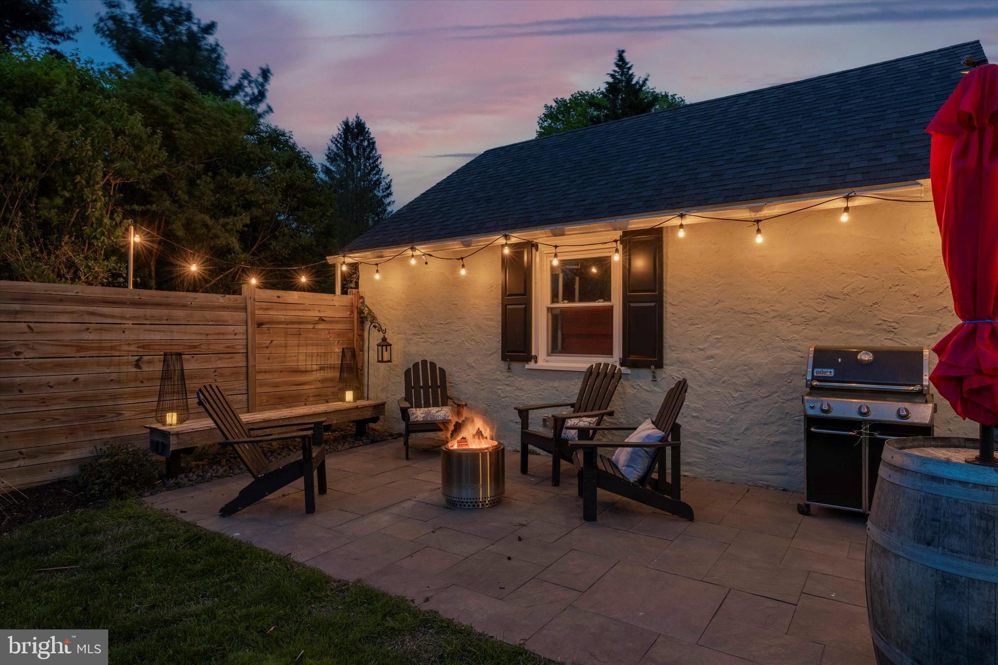 403 Old Lancaster Road Berwyn, PA 19312 - Photo 39 of 41 a view of a patio with table and chairs and potted plants